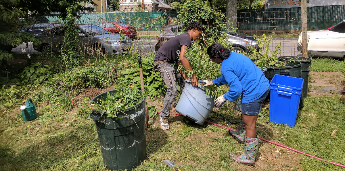 photo: man and woman work in garden