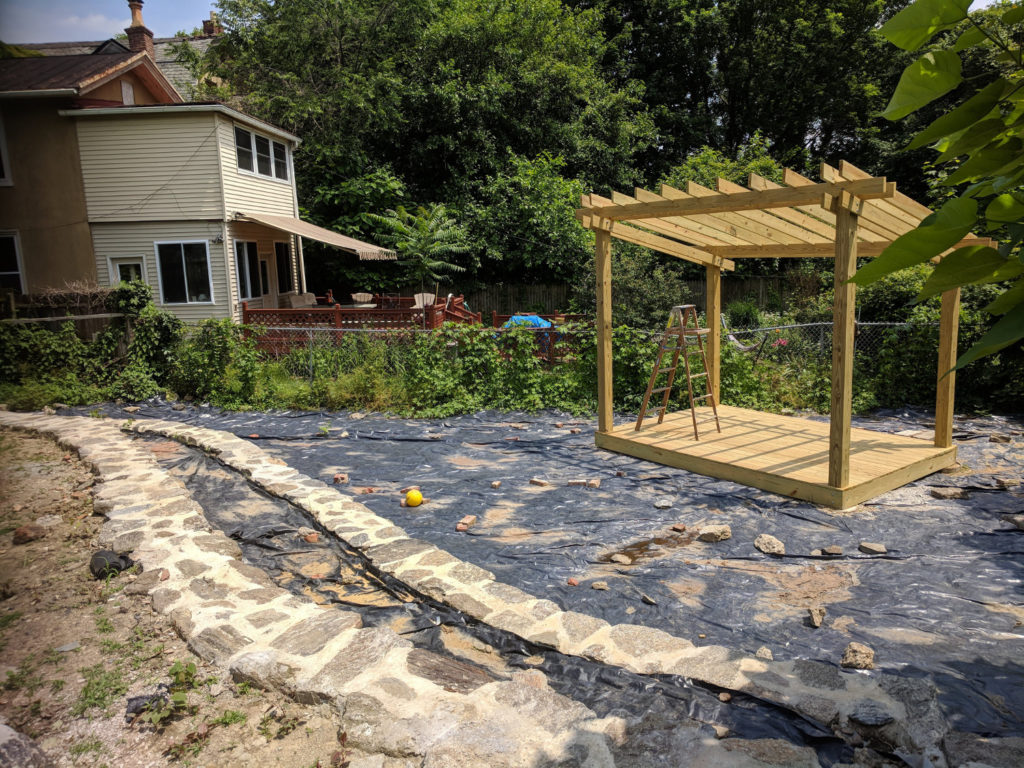 photo: wooden structure at bottom of amphitheater