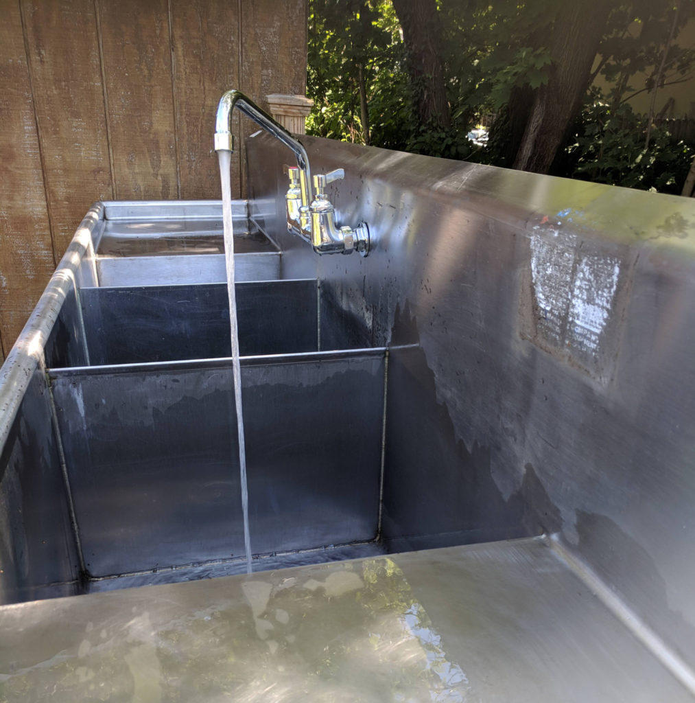 photo: sink with water running